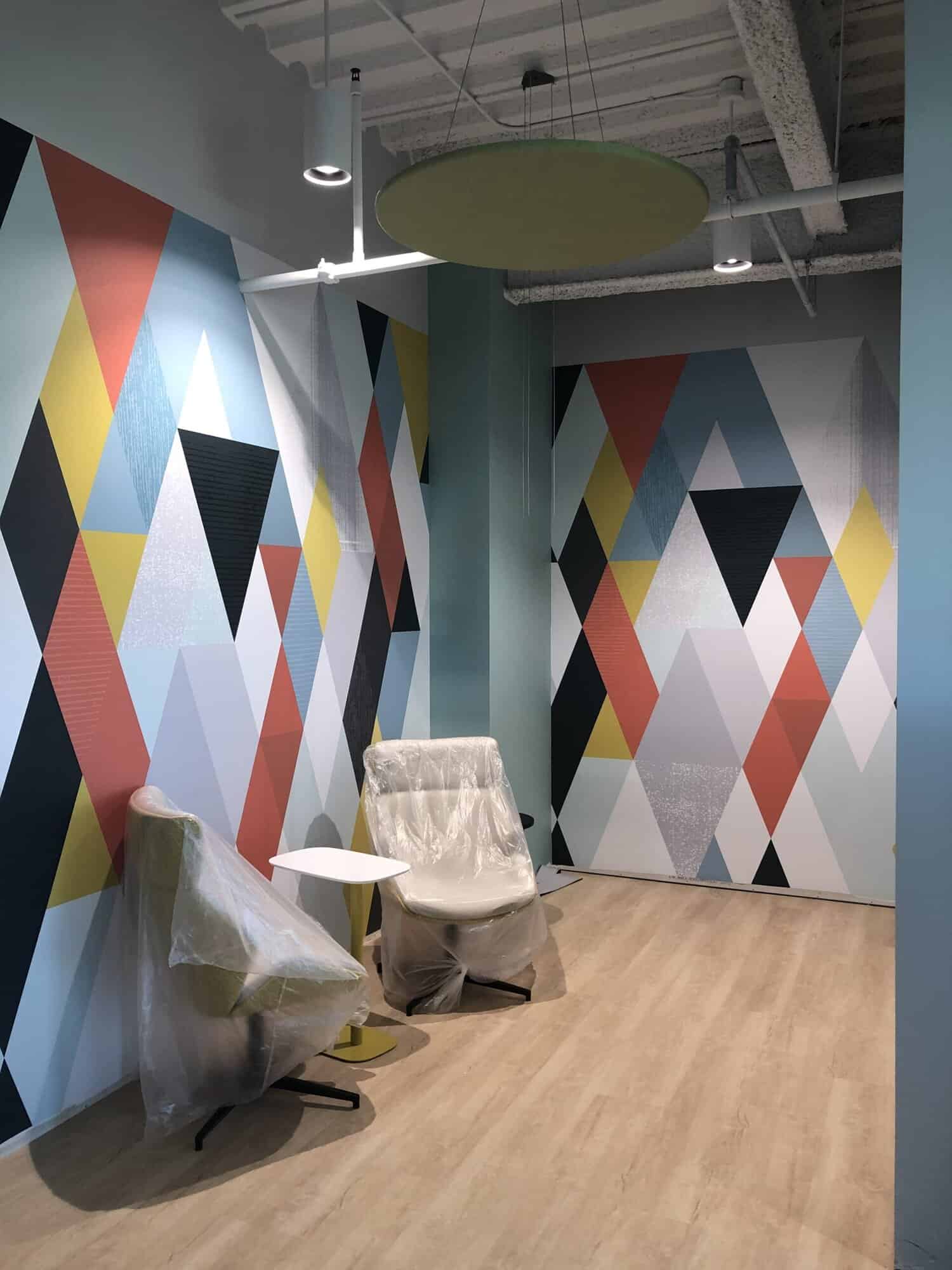 Painted geometric feature wall in an office
